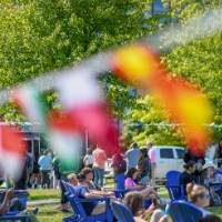 Students Sitting on Lawn